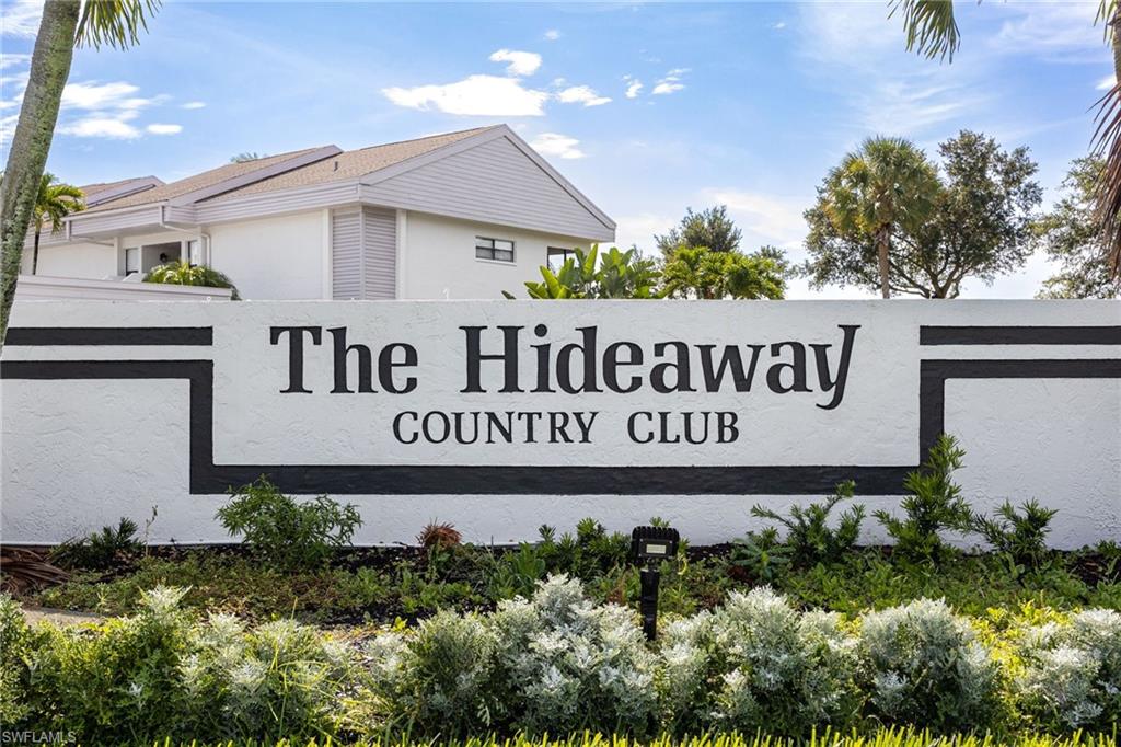 Entry monument with "The Hideaway Country Club" lettering