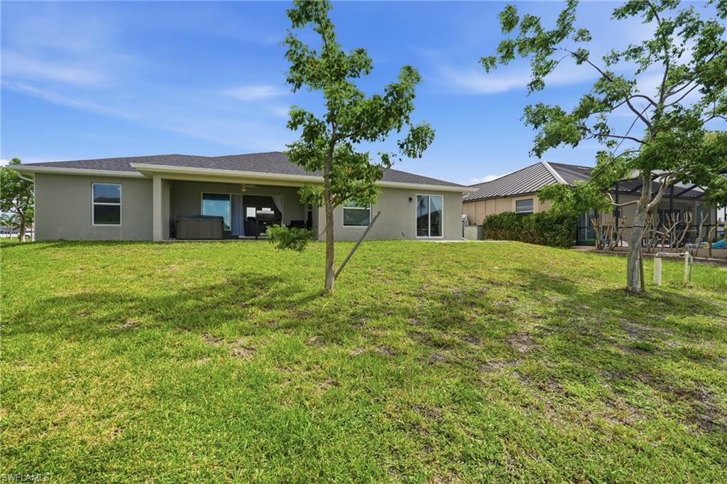 Expansive backyard with room for pool and dock and lift