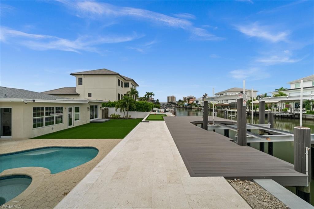 brand new dock, lift, seawall.