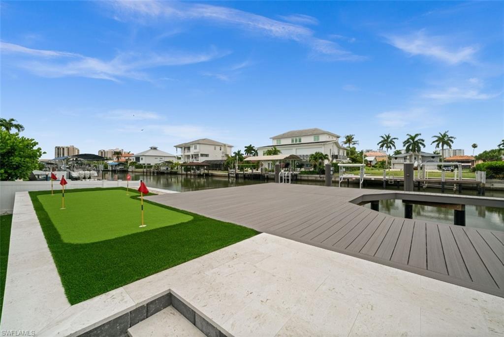 putting green overlooking the gulf access canal