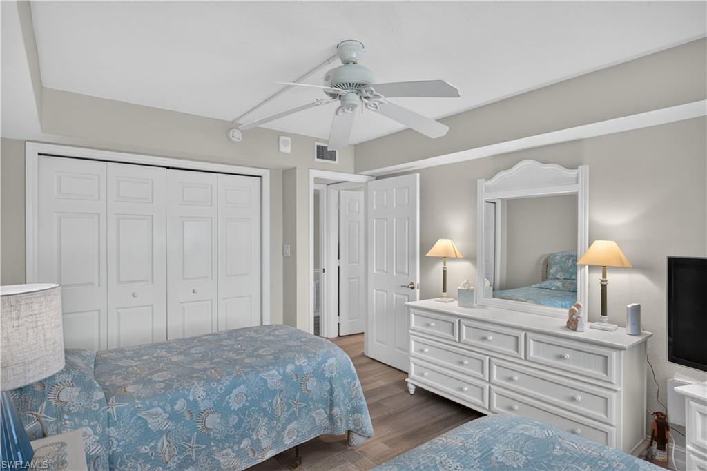 Guest bedroom with large closet leads to the bathroom -hallway has a pocket door to make this room a suite.