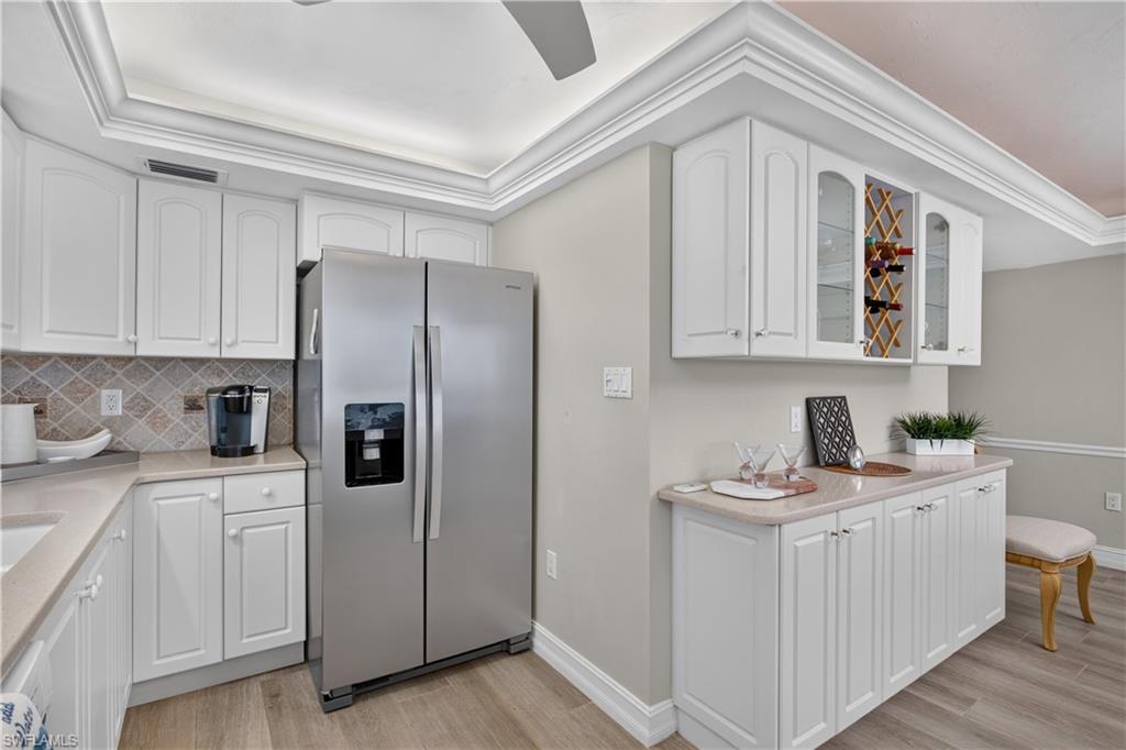 Brand new fridge, extra cabinetry and counter in dining area-great for a coffee or wine bar!