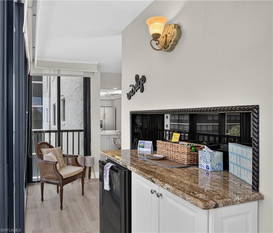 Built in bar with extra storage and beverage fridge.