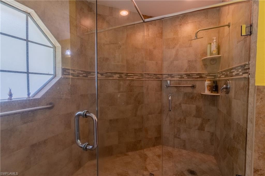 Bathroom featuring a shower stall
