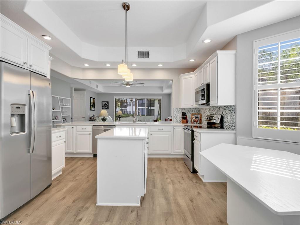 Kitchen with easy access to the dining room and also closes off with pocket doors.