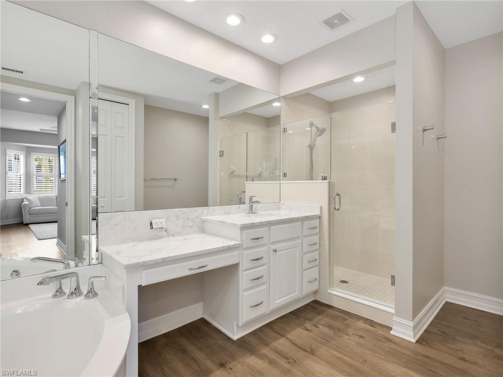 Primary Bathroom with Walk in Tile Shower