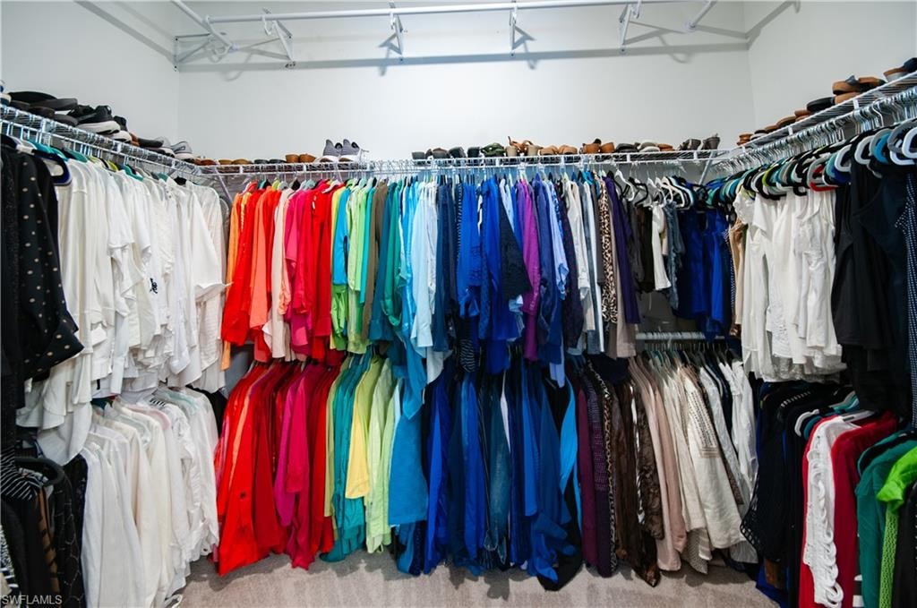 Walk-in closet featuring floor-to-ceiling organization