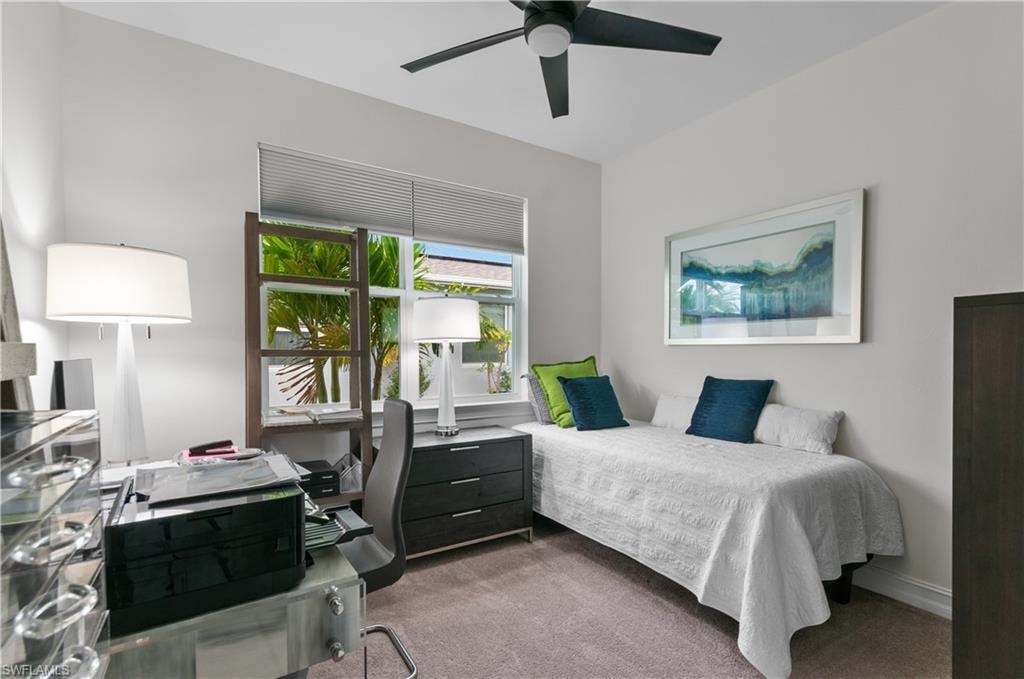 Neutral tone wall paint with a contrasting dark ceiling fan