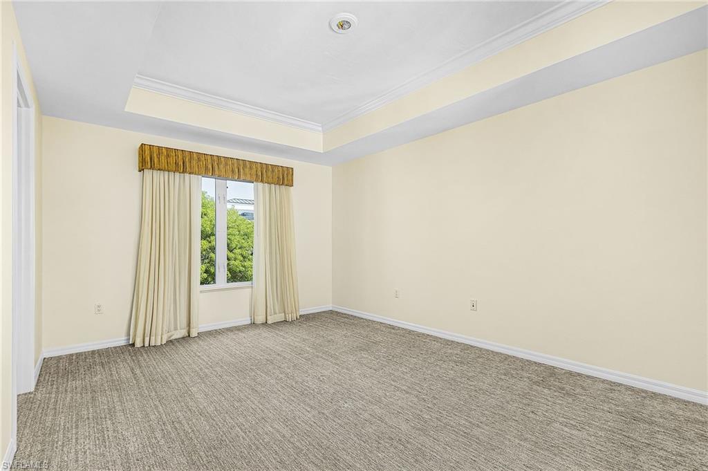 Recessed lighting in a tray ceiling with crown molding