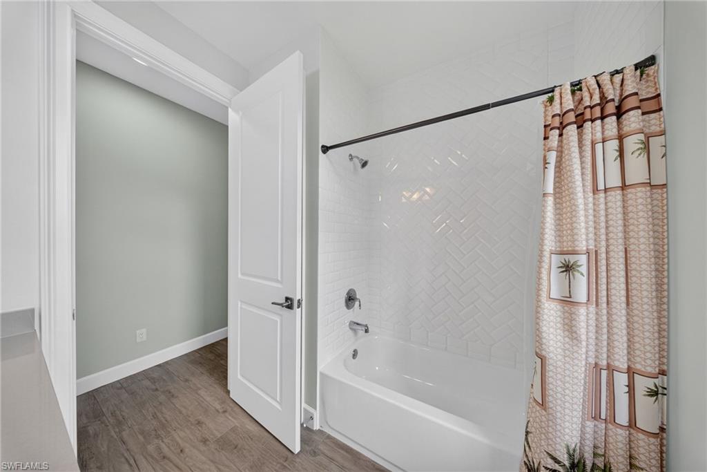 Full bathtub and shower combination.