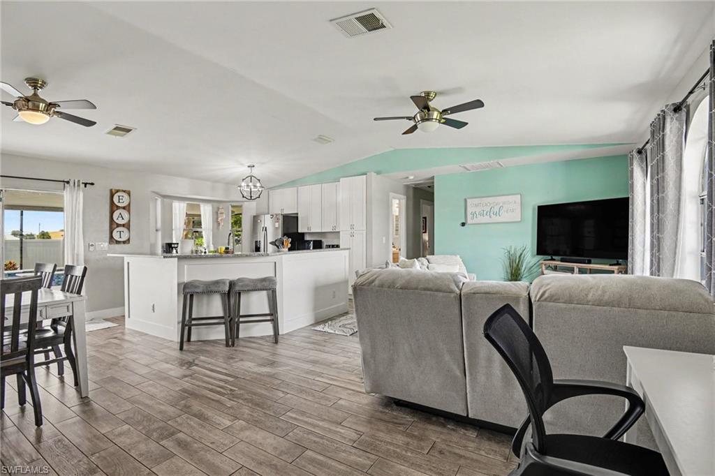 Beautiful natural lighting, well equipped kitchen, comfortable living and dining areas.