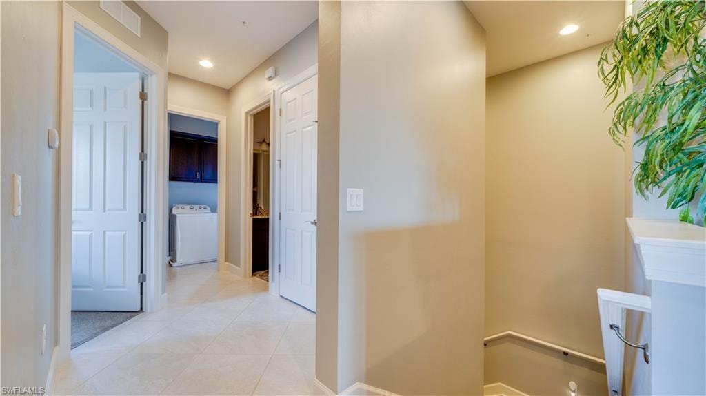 Stairs lead down to the Garage and Front Door