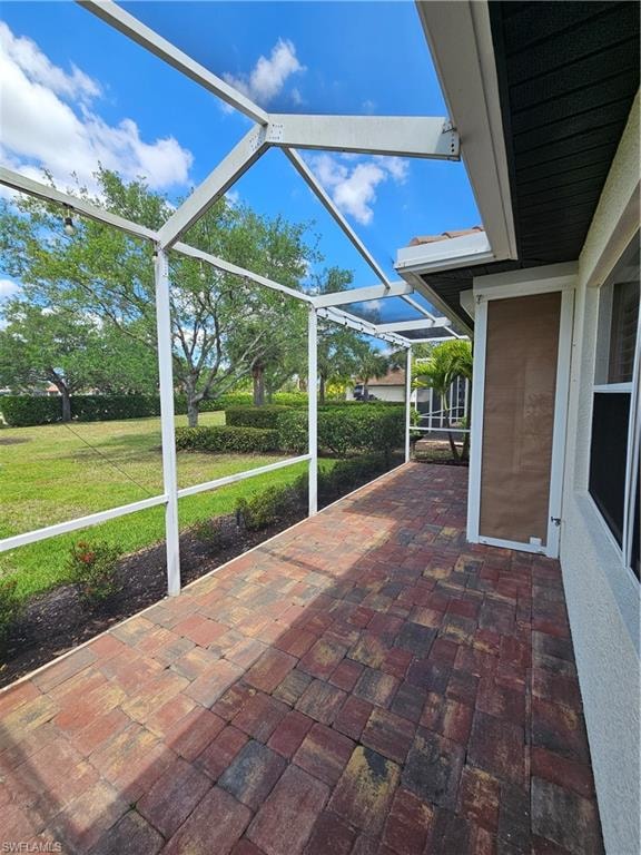 View of patio / terrace with a lanai and a sunroom