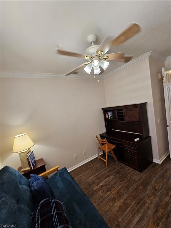 Living area featuring ornamental molding, dark wood-style flooring, and a ceiling fan