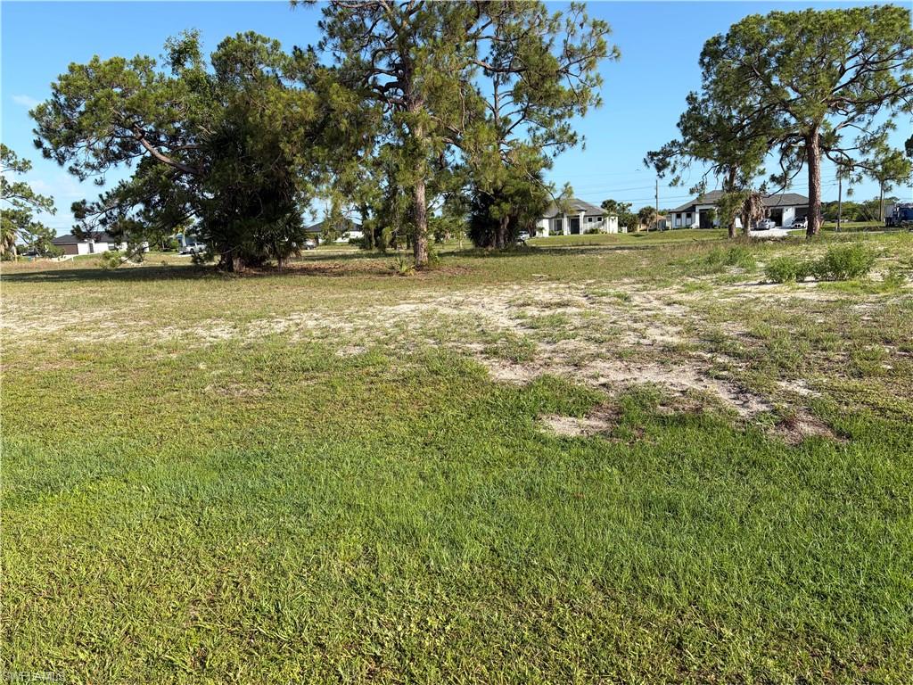 This property offers a peaceful neighborhood setting with quick access to shopping, dining, and major roadways.