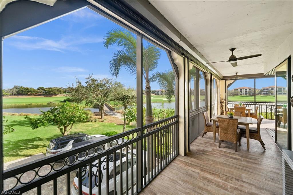 Sunroom featuring a water view, ceiling fan, outdoor dining space, a balcony, and view of golf course