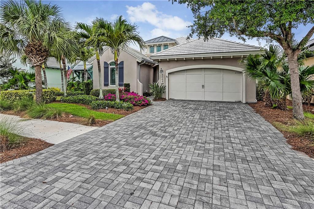 View of front of home featuring a garage