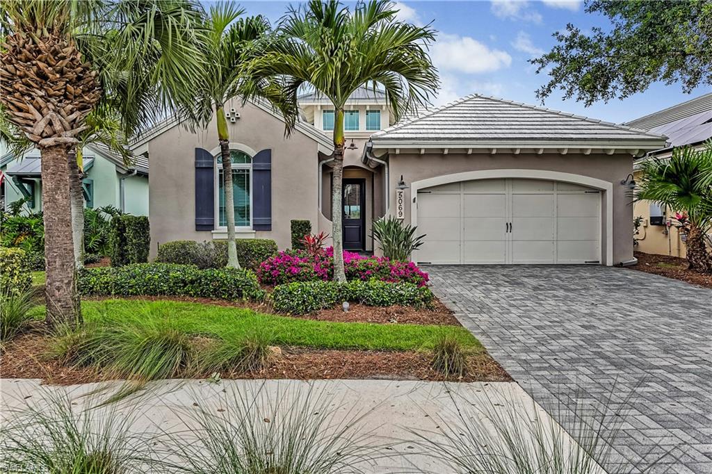 View of front of home with a garage