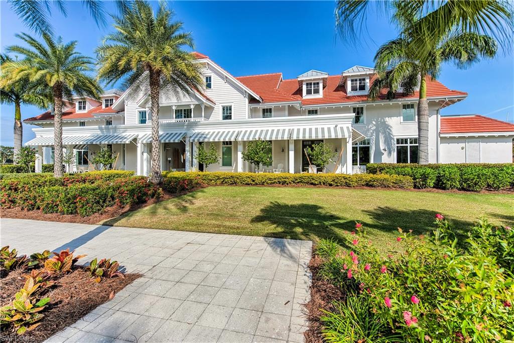 View of front of house with a front yard