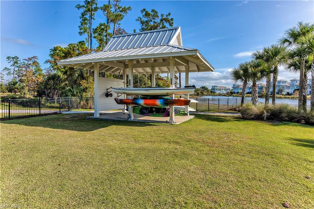 View of yard with a water view