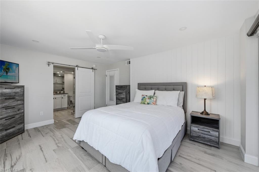 Primary bedroom with marina view