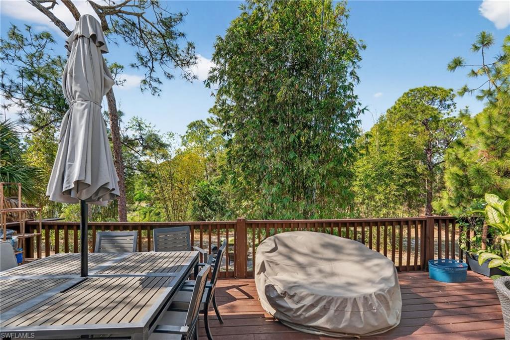 Spacious wood-finish deck with a wood railing system