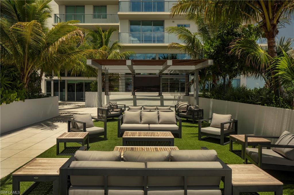 Elevated Sun Deck with private poolside cabanas, grills, and firepits