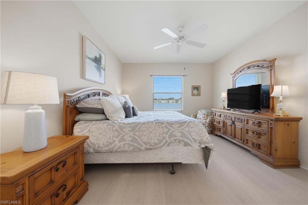 Light wood-finish flooring complements the neutral wall tones