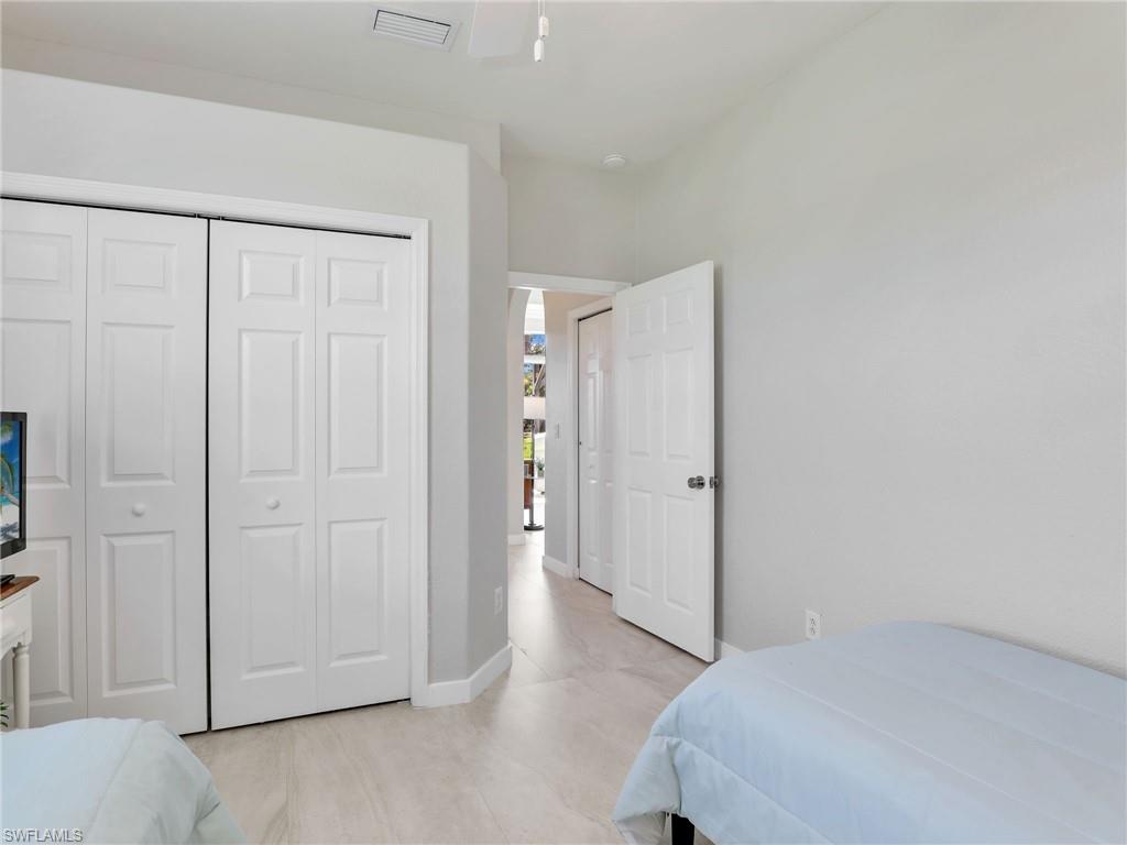 Bedroom with a closet and baseboards