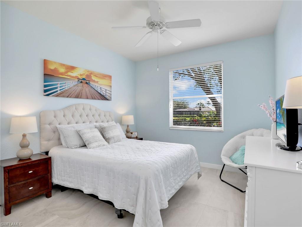 Bedroom with baseboards and ceiling fan