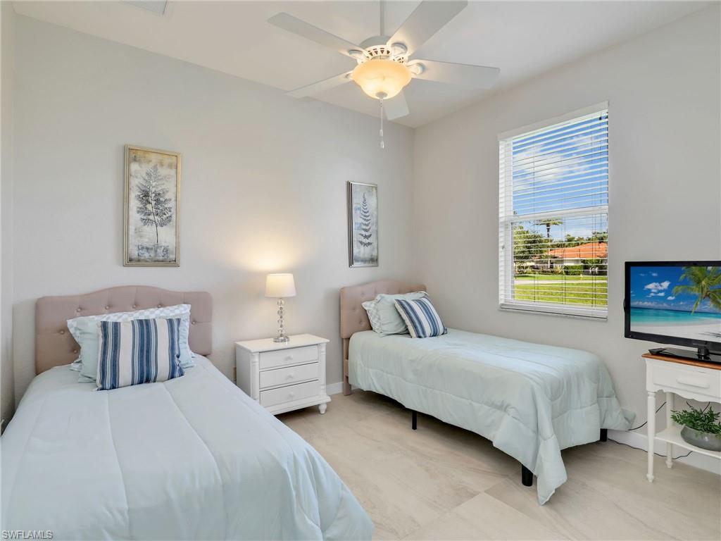 Bedroom with baseboards and ceiling fan