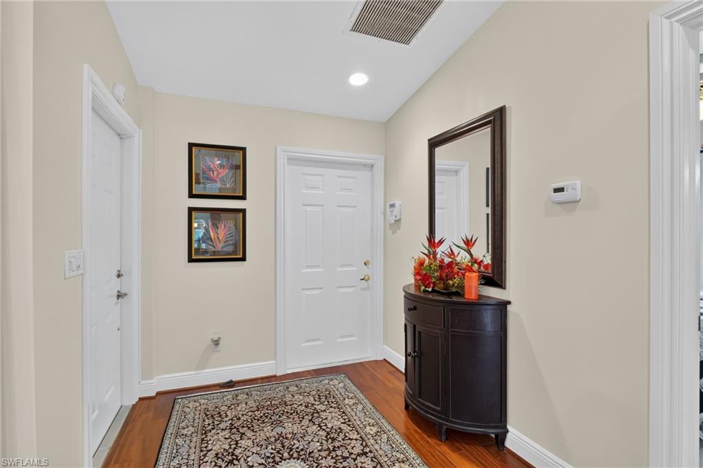Entry door on left, garage door center, bedroom door right