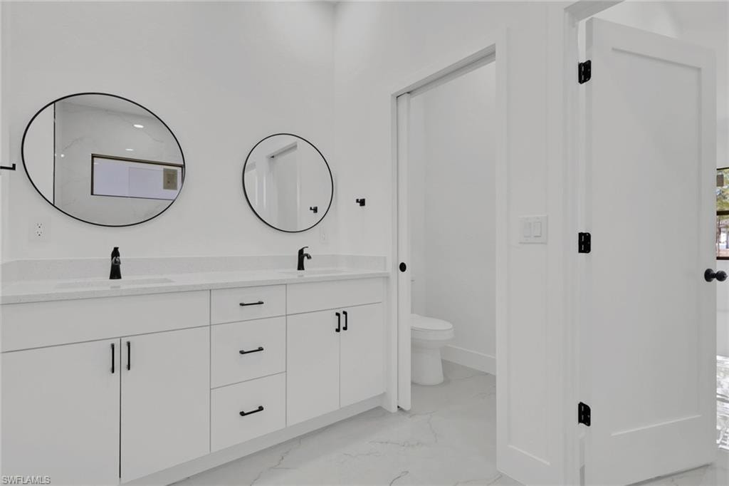 Primary bathroom with dual vanity