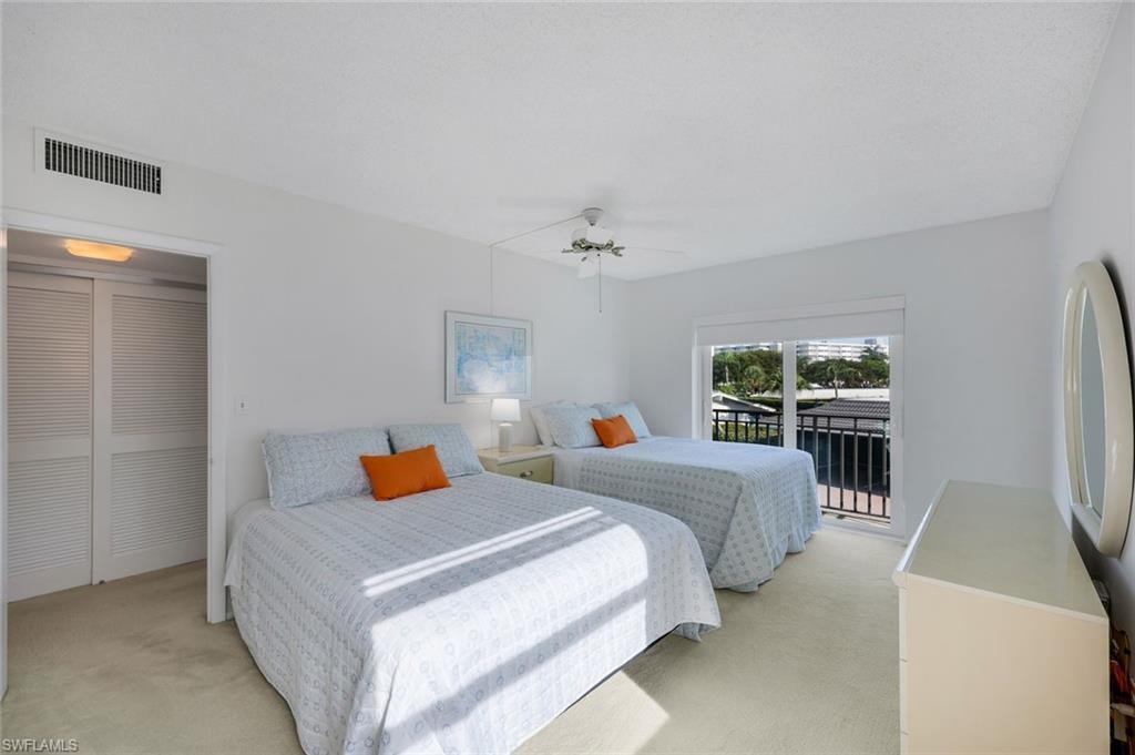 Primary Bedroom with two queen beds and ensuite bathroom