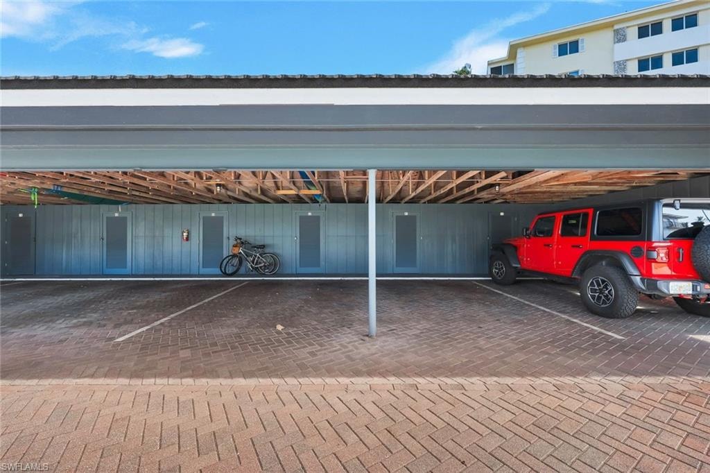 One covered parking space 30 steps to the unit