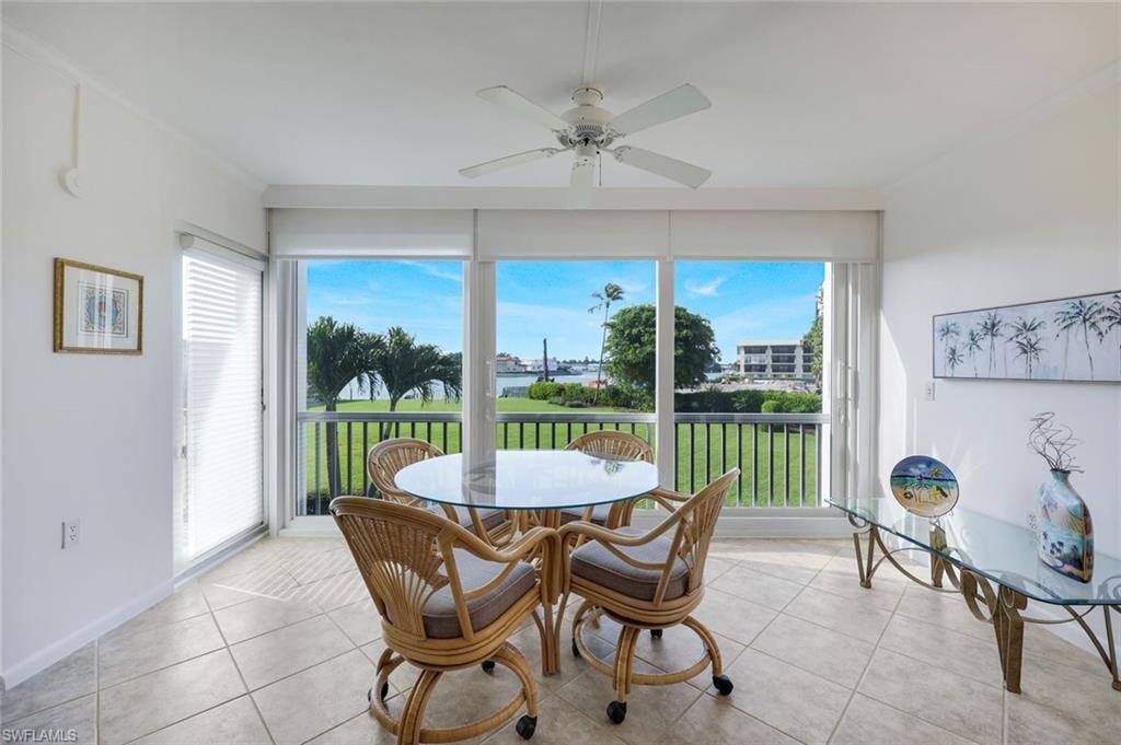 Florida Room overlooking Bay waters and landscape area