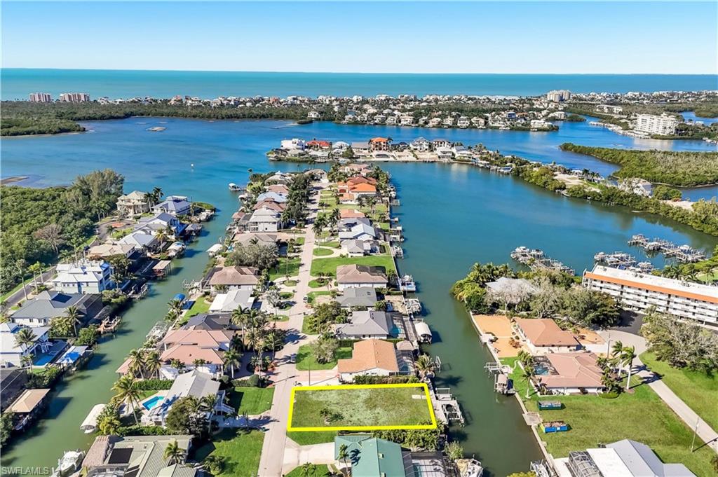 Waterfront parcel featuring direct canal access to expansive bay waters - Virtually Edited Image