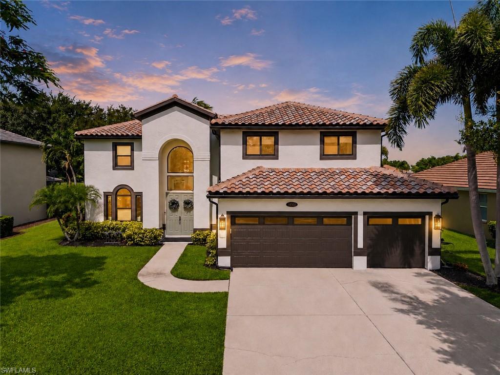 Two story residence a new tile roof, stucco exterior, and a two-car garage