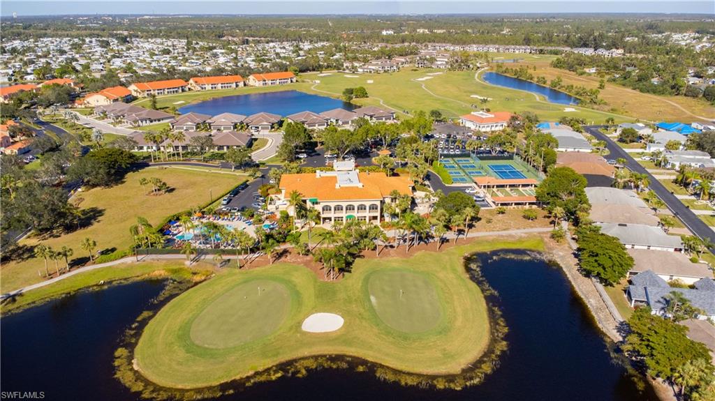 Aerial depiction of a residential community featuring a golf course, multiple lakes, and extensive green spaces
