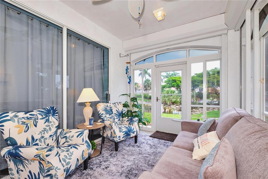 Living area featuring ceiling fan