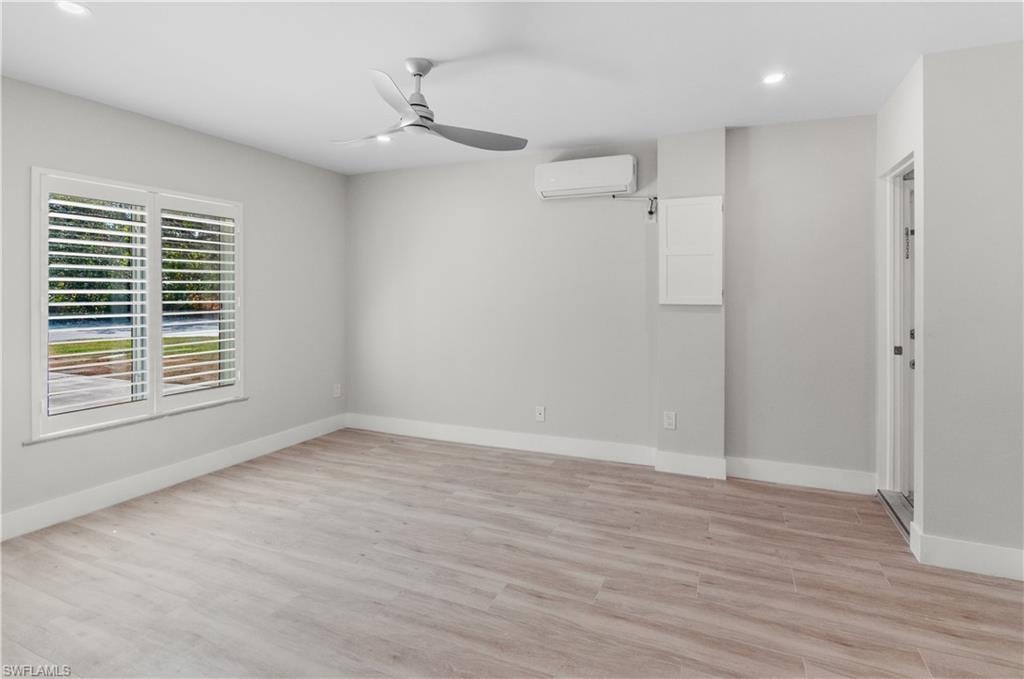 FAMILY ROOM OFF LIVING AREA BY FRENCH DOORS. WAS THE GARAGE. STEPS UP TO LAUNDRY ROOM