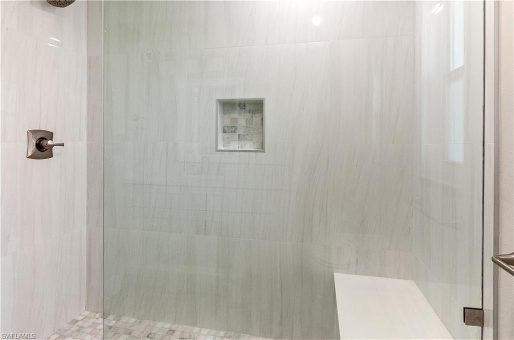 Bathroom#2 featuring tiled shower