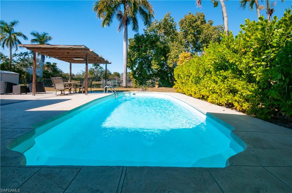 Outdoor pool featuring a patio salt water pool
