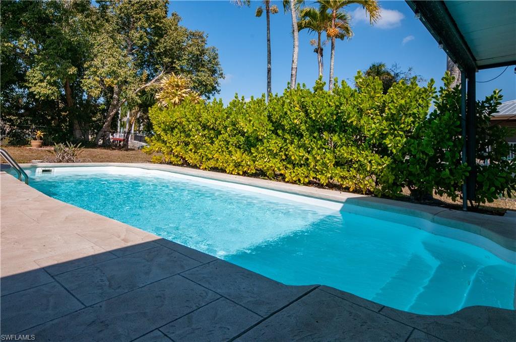Outdoor pool featuring a patio area SALT WATER
