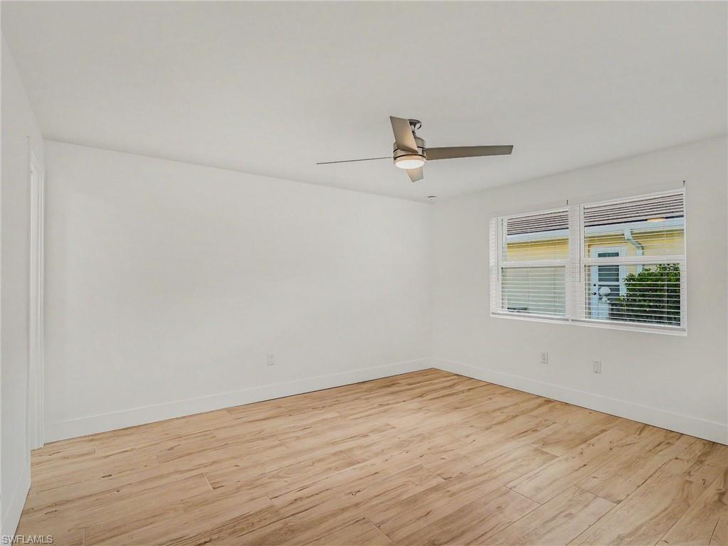 Second bedroom at front of home, 5 x 5 ft walk-in closet off to the left