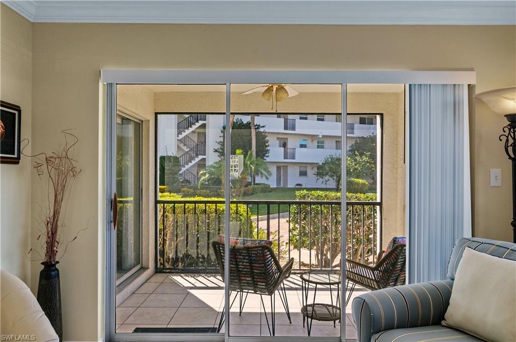 Living room opens to screened lanai. Parking space is next to lanai.