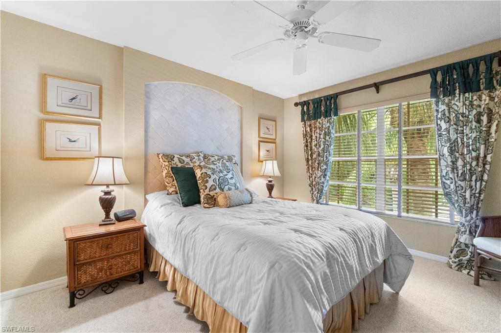 Bedroom with carpet and ceiling fan