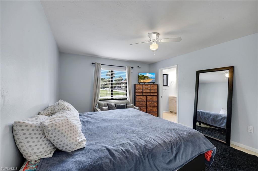 Primary suite features a large window and ensuite bathroom.