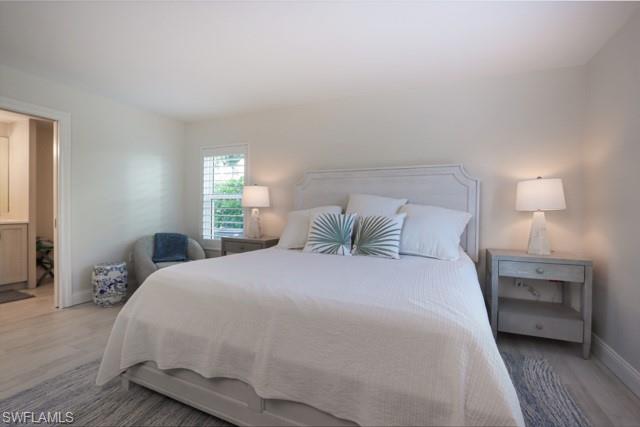 Bedroom featuring wood finished floors