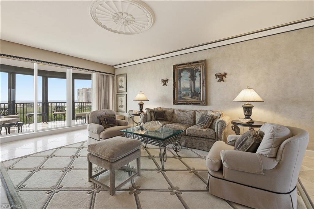 Living room with light tile patterned floors